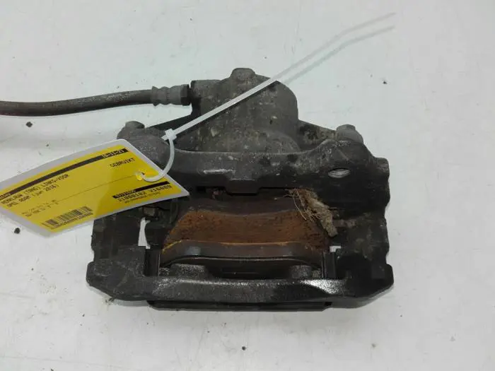 Front brake calliper, left Opel Adam