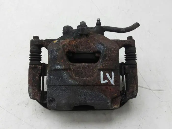 Front brake calliper, left Opel Astra