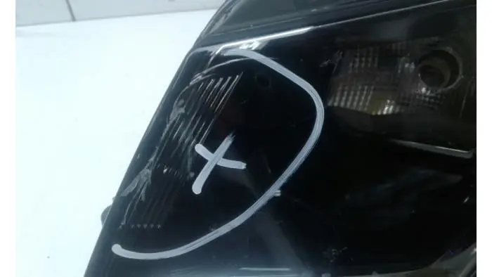 Headlight, left Volkswagen Caddy