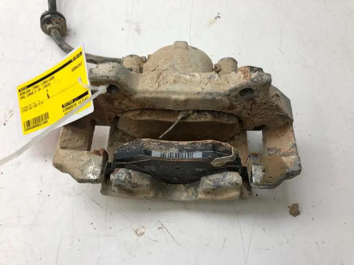 Front brake calliper, left Opel Corsa