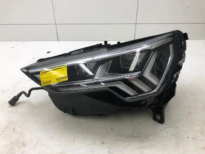 Headlight, left Audi Q3